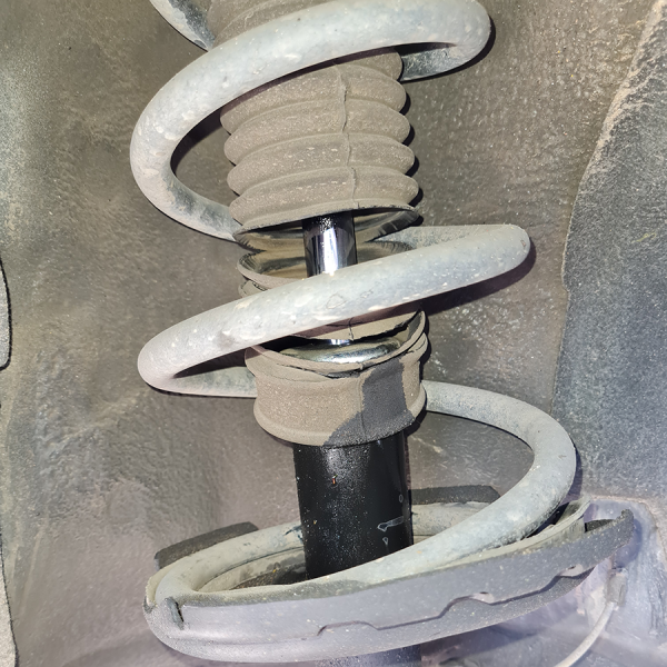 Broken boot on a strut